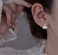 Boucles d'oreilles clous en zircon plaqué argent de haute qualité pour femme, petites et délicates, motif nœud de danse, bijoux doux, cadeau, boucles d'oreilles de ballet