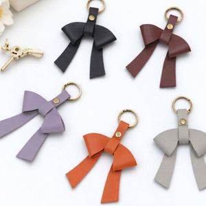 HR Stocked PU Leather Elegant <b>Bow</b> Keychain Leather <b>Bow</b> Charm for Bag Purse Leather <b>Bow</b> Knot Key Ring for GIfts - Product Image 1