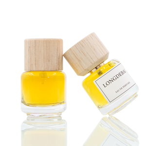 Nuevo Diseño 2025: Mini Botella de Perfume Redonda de Vidrio Transparente de 30 ml, Botella de Spray de Perfume Vacía con Tapa de Madera y Caja de Empaque - Product Image 3