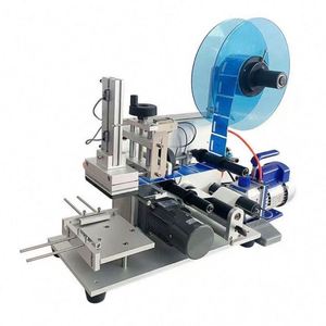 Machine d'étiquetage semi-automatique pour bocaux en verre, à entraînement électrique, avec emballage en carton bois et composants PLC - Product Image 1