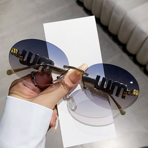Miao Family Frameless Cut Edge <b>Sunglasses</b> UV400 Black Unisex PC Lens European American Style - Product Image 1