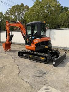 Excavatrice sur chenilles Kubota KX057-5 d'occasion de 5 tonnes, mini-pelle hydraulique avec godet de creusement et lame angulaire - Product Image 2