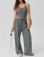 Nouvel ensemble de vêtements de sport pour femmes, haut de sport à rayures et pantalon évasé, vêtements de fitness, yoga, 2 pièces