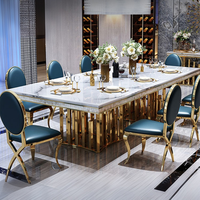 Ensemble de table et chaises de salle à manger extensible moderne de luxe durable avec plateau en marbre, structure en acier inoxydable, imperméable, écologique, assemblé