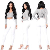 Jeans pour femmes à la mode en gros d'usine taille haute élastique petit pied coupe ajustée porte-stylo pour femmes