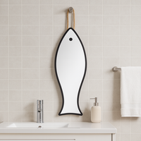 Miroir mural décoratif en forme de poisson unique Miroir suspendu en corde à cadre noir pour la décoration intérieure