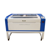 Vente chaude d'usine, graveur laser CO2 automatique économique de 60 W, découpeuse de contour, système Ruida avec CE pour matériaux non métalliques