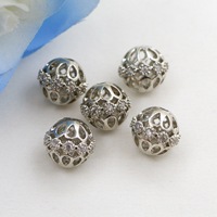 Accessoires de fabrication de bijoux en argent plaqué or cuivre creux rond fleur entretoise pour femmes collier bracelet