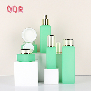 Juego de Envases Vacíos de Lujo para Crema, Loción y Sérum para el Cuidado de la Piel, Botellas Acrílicas Verdes con Fondo Grueso, Pulverizador y Bomba, Color Personalizado - Product Image 1