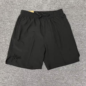 Pantalones cortos deportivos de poliéster en blanco personalizados para hombre, pantalones cortos transpirables de secado rápido para gimnasio, pantalones cortos para correr - Product Image 3