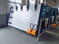 Machine de serrage de cadre de montage pneumatique pour porte de placard