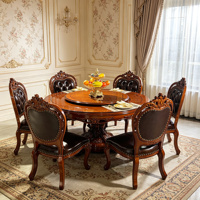 Europäisches Königliches Massivholz Rundes Esszimmer-Set mit Drehplatte Handgeschnitzte Schwarze PU-Leder Stühle Esszimmermöbel Großhandel