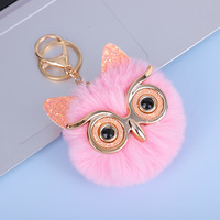 Porte-clés animal et décoration de sac Owen Porte-clés en peluche à pompons en fausse fourrure multicolore