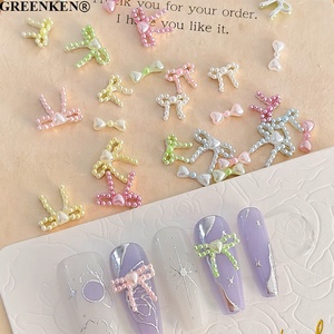 10 pièces/sac nouveaux accessoires pour ongles coréens japonais Macarons multicolores arc breloques pour ongles avec perle douce strass pour ongles - Product Image 2