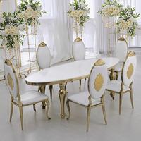 Chaise de banquet de mariage ovale de luxe en acier inoxydable doré, avec dossier sculpté et rembourrage blanc