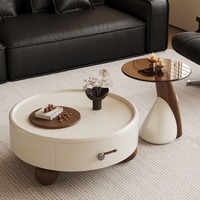 Ensemble de tables basses rondes vintage de luxe, table de salon minimaliste avec espace de rangement, exsudant une sophistication