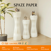 Support rotatif Spazepaper, présentoir artistique en papier pliable, socle incurvé en papier kraft pour la décoration de boutiques, de galeries et de stands éphémères