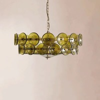 Pendentif en forme de pièce de monnaie ronde vintage française allumant le lustre Lorenzo en verre en couches d'ambre pour l'hôtel à la maison