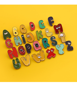 Pin <span class=keywords><strong>de</strong></span> solapa <span class=keywords><strong>de</strong></span> metal esmaltado con diseño <span class=keywords><strong>de</strong></span> 26 letras del alfabeto <span class=keywords><strong>inglés</strong></span>, monstruo <span class=keywords><strong>de</strong></span> dibujos animados, insignia creativa y colorida para sombrero, accesorios. - Product Image 1