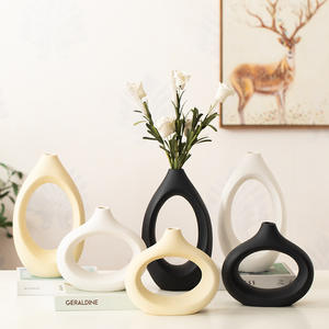 แจกันตั้งโต๊ะลายคราม ดีไซน์ยุโรปหรูหราสไตล์โบฮีเมียน เป็นมิตรกับสิ่งแวดล้อม ฐานกันลื่น รับน้ำได้ ความสูง 24 นิ้วขึ้นไป สำหรับตกแต่งบ้าน - Product Image 1