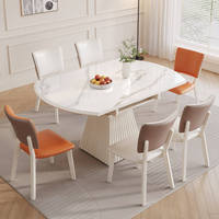 Table à manger ovale extensible moderne en gros, plateau en cuir, pieds en acier, meuble idéal pour gagner de la place dans les petits appartements