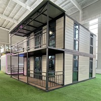 Maison de conteneur pliable extensible à deux étages électrique préinstallée avec escalier intérieur pour villa ou hôtel de luxe