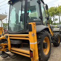 100% Backhoe Loader Bekas Asli dan Mesin Multifungsi Seken yang Menggabungkan Fungsi Penggali dan Pemuat untuk Konstruksi yang Efisien