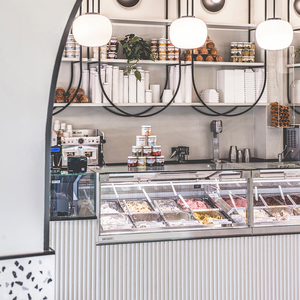 Airy Luxe Bakery & Coffee Market Stall Featuring Glass Display Case, Open Tiered Shelving, and Integrated Warm Lighting - Product Image 2