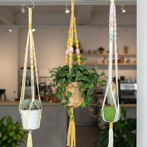Ornement <span class=keywords><strong>de</strong></span> <span class=keywords><strong>pot</strong></span> <span class=keywords><strong>de</strong></span> <span class=keywords><strong>fleurs</strong></span> en macramé artisanal Art déco avec pompon en fibre naturelle Fil <span class=keywords><strong>de</strong></span> coton <span class=keywords><strong>de</strong></span> 1 mm Décoration <span class=keywords><strong>de</strong></span> pièce pour utilisation en extérieur - Product Image 1
