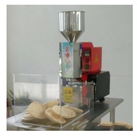 Machine automatique de fabrication de gâteaux de riz
