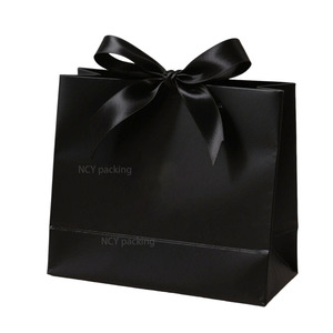 Custom Durable Classic Luxury White Paper Bags with Custom Logo Ribbon Handle for Boutique Shopping Gift and Shoes/Clothing - Product Image 1