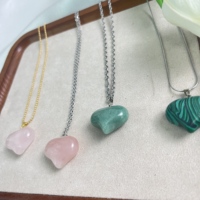 Grossiste Pendentifs de guérison en forme de cœur en quartz clair Pierre de cristal rose clair en forme de cœur à vendre