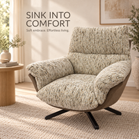 Fauteuil pivotant moderne en cuir écologique et tissu, avec structure en fer et plumes, pour salon ou hôtel