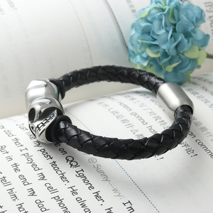 Titanium Steel Skull <b>Bracelet</b> Black Woven <b>Leather</b> Band Fashion Jewelry for Men and Women - Product Image 3