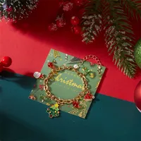 Bracelet CUMAI avec pendentifs Père Noël, bonhomme de neige, sapin et cloche pour femme – Bijou exquis réglable pour fêtes et vacances, idéal comme cadeau