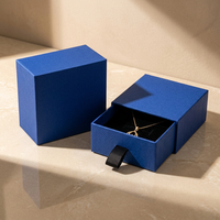 Boîte cadeau rigide pliable gaufrée de luxe durable et écologique en carton recyclé, imprimée sur mesure, avec tiroir doré de marque