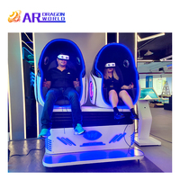 Cinéma d'intérieur de jeu de simulateur de la chaise VR d'oeufs du double des fabricants 9D de la Chine pour l'amusement de parc de trampoline