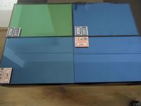 Verre réfléchissant coloré teinté bleu bronze gris vert rose clair
