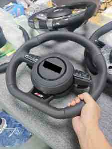 Ensamblaje de Campaña de Volante con Base Plana de Cuero Totalmente Perforado para <span class=keywords><strong>Audi</strong></span> A3 A4 A5 A6 A7 Q3 Q5 Q7 - Product Image 6