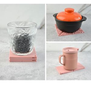 Foldable Triangular Silicone Heat-resistant <b>Trivet</b> Mat, Multi-purpose Kitchen Silicone Pot Stand Pad - Product Image 5