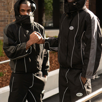Ensemble de veste coupe-vent réfléchissante légère personnalisée, veste en nylon zippée, survêtement streetwear, survêtement sportif en polyester à rayures pour hommes