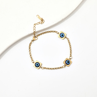 Bracelet chaîne classique bleu marine et blanc avec trois breloques espacées, en acier inoxydable plaqué or, avec fermoir mousqueton et rallonge, pour soirée méditerranéenne