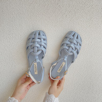 Sandales plates tissées ajourées à bout fermé style français pour femme, collection été 2026, chaussures de plage