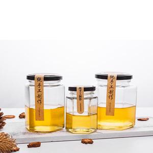 Échantillon gratuit 1.5oz 6oz 12oz 16oz Récipient de miel Pot de <span class=keywords><strong>conserve</strong></span> Pot de confiture de miel <span class=keywords><strong>en</strong></span> <span class=keywords><strong>verre</strong></span> hexagonal avec couvercle <span class=keywords><strong>en</strong></span> métal - Product Image 4