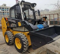 Chargeuse compacte 365B à haute efficacité avec attache rapide hydraulique pour les travaux de construction, d'aménagement paysager et municipaux