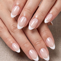 Ongles à presser ultra-fins, transparents comme de la glace, couleur nude, forme amande moyenne-courte, lignes minimalistes pré-dessinées