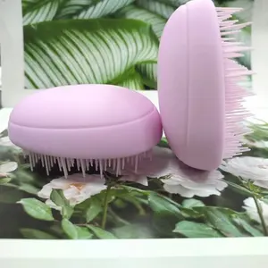Children's hair comb in the shape of an egg massager clean comb hair shampoo scalp portable travel brush