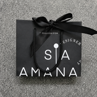 Sac cadeau de luxe en papier kraft avec logo en feuille d'or gaufrée et emballage personnalisé pour bijoux