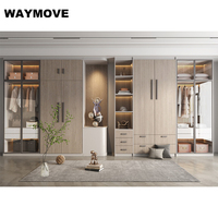 Armoire italienne moderne personnalisée à porte coulissante automatique pour chambre à coucher ou hôtel style panneau en bois