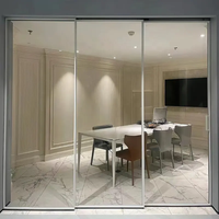Porte coulissante en verre à cadre fin en aluminium de style européen avec poulie silencieuse et poignée minimaliste moderne pour la séparation de cuisine et de chambre